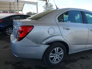 2013 Chevrolet Sonic LT with VIN 1G1JC5SB2D4243632, listed as a IAAI auction lot 42072421 with 40,289 mi miles and . Bid and sale history available at DreamBid. Image 6.