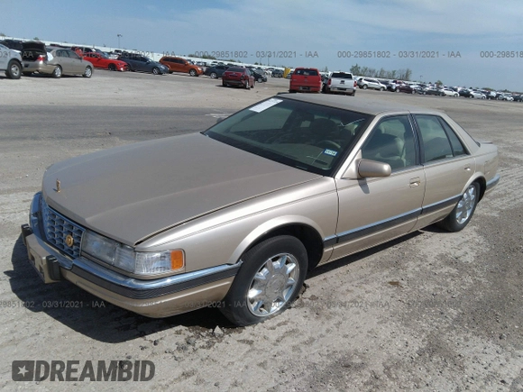 1997 Cadillac Seville Luxury SLS z VIN 1G6KS52Y7VU809288, wystawiony jako IAAI lot #29851802 z przebiegiem 93 879 mil mil oraz . Historia ofert i sprzedaży dostępna na DreamBid. Obrazek 2.