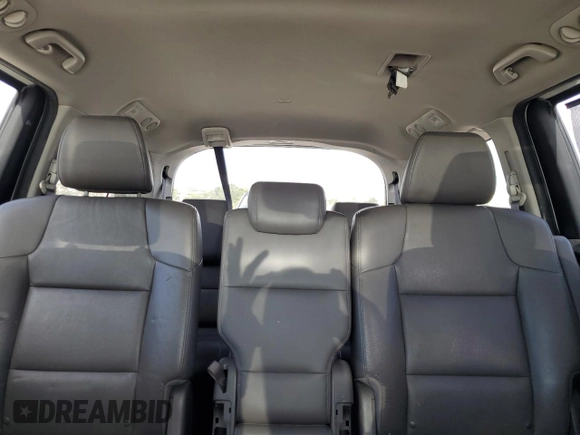 2017 Honda Odyssey Touring z VIN 5FNRL5H99HB007993, wystawiony jako Copart lot #60501805 z przebiegiem 104 628 mil mil oraz Szkoda całkowita • Salvage title. Historia ofert i sprzedaży dostępna na DreamBid. Obrazek 10.