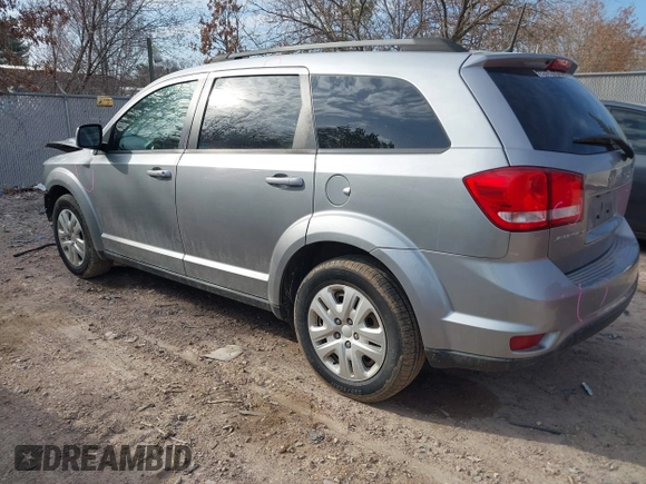 2019 Dodge Journey SE with VIN 3C4PDCBB0KT719211, listed as a IAAI auction lot 41823499 with 151,569 mi miles and . Bid and sale history available at DreamBid. Image 3.