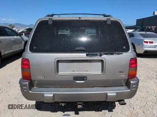 1998 Jeep Grand Cherokee Limited z VIN 1J4GZ88Z8WC306919, wystawiony jako Copart lot #61505725 z przebiegiem 195 329 mil mil oraz Czysty tytuł • Clean title. Historia ofert i sprzedaży dostępna na DreamBid. Obrazek 6.