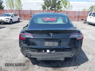 2022 Tesla Model 3 with VIN 5YJ3E1EA4NF316127, listed as a IAAI auction lot 41939191 with 30,857 mi miles. Bid and sale history available at carsss.com. Image 16.