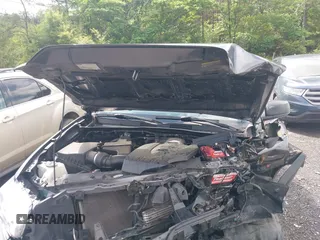 2020 Toyota Tacoma SR z VIN 5TFRZ5CN0LX088271, wystawiony jako IAAI lot #42169345 z przebiegiem 75 654 mil mil oraz . Historia ofert i sprzedaży dostępna na DreamBid. Obrazek 10.