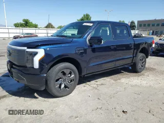 2023 Ford F-150 Lightning Pro z VIN 1FTVW1EV4PWG61634, wystawiony jako Copart lot #57887145 z przebiegiem 18 222 mil mil oraz Szkoda całkowita • Salvage title. Historia ofert i sprzedaży dostępna na DreamBid. Obrazek 1.