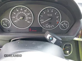 2015 BMW 3 Series 328i with VIN WBA3A5C55FF608159, listed as a IAAI auction lot 41255978 with 199,024 mi miles. Bid and sale history available at carsss.com. Image 11.