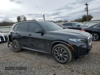 2025 BMW X5 xDrive40i with VIN 5UX23EU05S9Y99989, listed as a Copart auction lot 45664605 with 1,287 mi miles and Salvage Title. Bid and sale history available at carsss.com. Image 4.