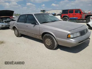 1996 Oldsmobile Cutlass Ciera 1SA VX5 z VIN 1G3AJ55M2T6354131, wystawiony jako Copart lot #74458314 z przebiegiem 55 998 mil mil oraz Szkody całkowita. Historia ofert i sprzedaży dostępna na DreamBid. Obrazek 4.