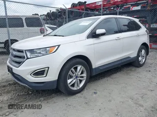 2015 Ford Edge SEL with VIN 2FMTK3J99FBC37403, listed as a IAAI auction lot 41970971 with 136,097 mi miles. Bid and sale history available at carsss.com. Image 2.