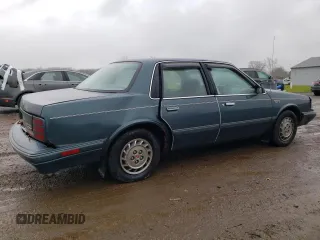 1996 Oldsmobile Cutlass Ciera 1SA VX5 z VIN 1G3AJ55M2T6382818, wystawiony jako Copart lot #80290114 z przebiegiem 137 463 mil mil oraz Szkody całkowita. Historia ofert i sprzedaży dostępna na DreamBid. Obrazek 3.