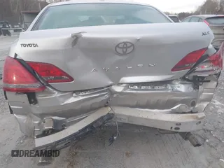 2009 Toyota Avalon XL with VIN 4T1BK36B69U329378, listed as a IAAI auction lot 41387338 with 163,023 mi miles and . Bid and sale history available at carsss.com. Image 6.