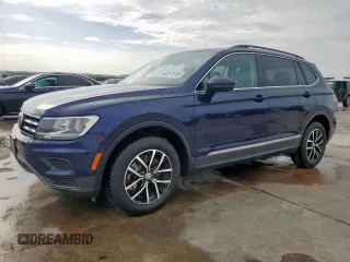 2021 Volkswagen Tiguan SE with VIN 3VV2B7AX6MM051899, listed as a Copart auction lot 62870765 with 56,848 mi miles and Clean title. Bid and sale history available at DreamBid. Image 1.