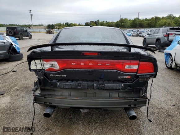 2012 Dodge Charger SRT8 with VIN 2C3CDXEJ8CH217246, listed as a Copart auction lot 71079334 with 105,528 mi miles and Salvage Title. Bid and sale history available at carsss.com. Image 6.