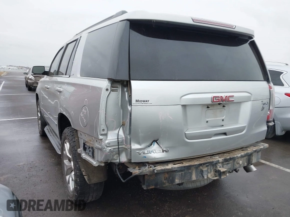 2015 GMC Yukon SLT with VIN 1GKS2BKCXFR131919, listed as a IAAI auction lot 41664827 with 149,398 mi miles. Bid and sale history available at carsss.com. Image 6.