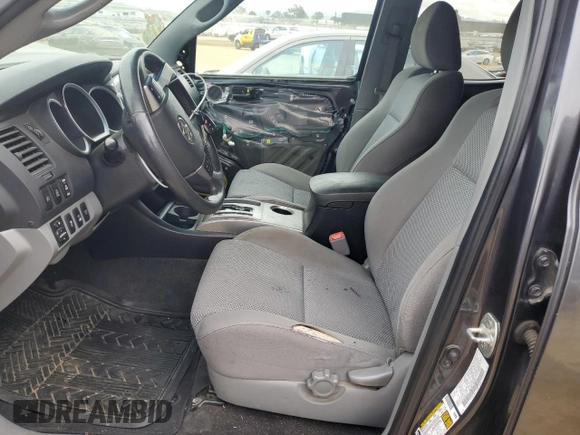 2013 Toyota Tacoma with VIN 3TMLU4EN5DM104791, listed as a Copart auction lot 43207965 with 121,427 mi miles and Salvage Title. Bid and sale history available at DreamBid. Image 7.