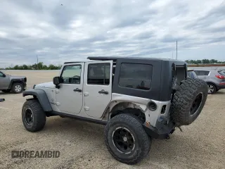2011 Jeep Wrangler Unlimited Rubicon with VIN 1J4BA6H13BL537964, listed as a Copart auction lot 57532725 with 71,498 mi miles and Salvage title. Bid and sale history available at DreamBid. Image 2.