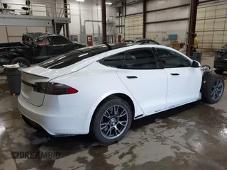 2022 Tesla Model S with VIN 5YJSA1E59NF469984, listed as a IAAI auction lot 42426490 with Not provided miles and . Bid and sale history available at DreamBid. Image 4.