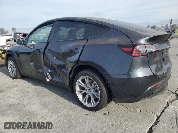 2024 Tesla Model Y Long Range with VIN 7SAYGDEE8RF089456, listed as a Copart auction lot 85521934 with 13,837 mi miles and Salvage title. Bid and sale history available at DreamBid. Image 2.