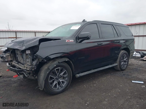 2021 Chevrolet Tahoe Z71 with VIN 1GNSKPKD6MR292595, listed as a IAAI auction lot 41750497 with 34,896 mi miles. Bid and sale history available at carsss.com. Image 2.