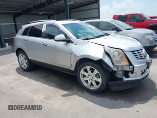2014 Cadillac SRX Performance Collection z VIN 3GYFNCE34ES525315, wystawiony jako IAAI lot #42657968 z przebiegiem 68 921 mil mil oraz . Historia ofert i sprzedaży dostępna na DreamBid. Obrazek 1.