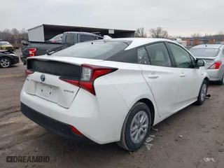 2021 Toyota Prius L Eco with VIN JTDKAMFU1M3149867, listed as a IAAI auction lot 41417036 with 84,421 mi miles. Bid and sale history available at carsss.com. Image 4.