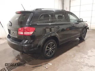 2017 Dodge Journey SE z VIN 3C4PDCAB4HT695490, wystawiony jako IAAI lot #41301719 z przebiegiem 103 642 mil mil oraz . Historia ofert i sprzedaży dostępna na DreamBid. Obrazek 4.