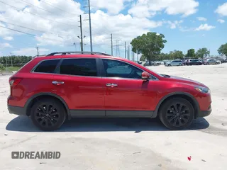 2015 Mazda CX-9 Grand Touring с VIN JM3TB2DA5F0464844, выставлен на аукционе IAAI как лот 42671898 с пробегом 164 165 миль миль и . История ставок и продаж доступна на DreamBid. Изображение 13.