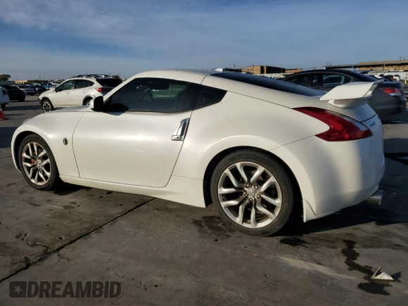 2013 Nissan 370Z with VIN JN1AZ4EH1DM381956, listed as a Copart auction lot 82839924 with 78,452 mi miles and Salvage Title. Bid and sale history available at carsss.com. Image 2.