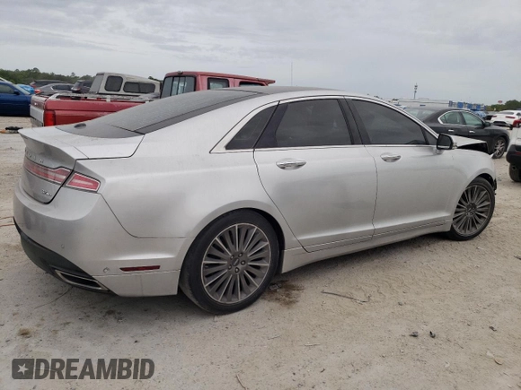 2014 Lincoln MKZ z VIN 3LN6L2JK3ER813137, wystawiony jako Copart lot #48230835 z przebiegiem 135 538 mil mil oraz Czysty tytuł • Clean title. Historia ofert i sprzedaży dostępna na DreamBid. Obrazek 3.
