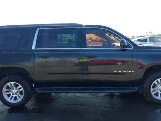 2018 Chevrolet Suburban LT z VIN 1GNSCHKC4JR111130, wystawiony jako IAAI lot #42383199 z przebiegiem 44 584 mil mil oraz . Historia ofert i sprzedaży dostępna na DreamBid. Obrazek 14.