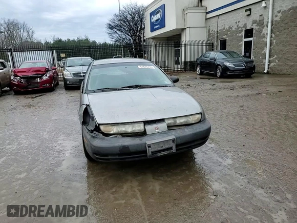 1998 Saturn SL with VIN 1G8ZF5285WZ204569, listed as a Copart auction lot 43624765 with 318,544 mi miles and Salvage Title. Bid and sale history available at carsss.com. Image 10.