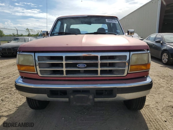 1997 Ford F-350 Crew Cab with VIN 1FTJW35F6VEC77988, listed as a Copart auction lot 69085154 with 261,172 mi miles and Salvage Title. Bid and sale history available at carsss.com. Image 5.