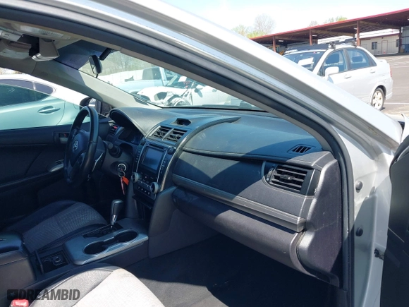 2014 Toyota Camry L with VIN 4T1BF1FK7EU354731, listed as a IAAI auction lot 41900006 with 217,767 mi miles. Bid and sale history available at carsss.com. Image 5.