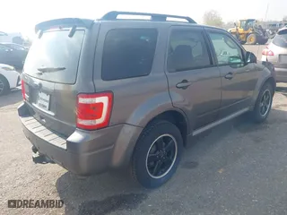 2011 Ford Escape XLT with VIN 1FMCU9D78BKC39019, listed as a IAAI auction lot 41903813 with 226,401 mi miles. Bid and sale history available at carsss.com. Image 4.