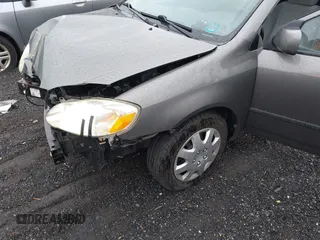 2005 Toyota Corolla CE with VIN 2T1BR32EX5C502293, listed as a IAAI auction lot 41969972 with 180,981 mi miles and . Bid and sale history available at DreamBid. Image 13.