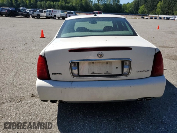 2005 Cadillac DeVille z VIN 1G6KD54Y65U100231, wystawiony jako Copart lot #55758605 z przebiegiem 166 871 mil mil oraz Szkoda całkowita • Salvage title. Historia ofert i sprzedaży dostępna na DreamBid. Obrazek 6.