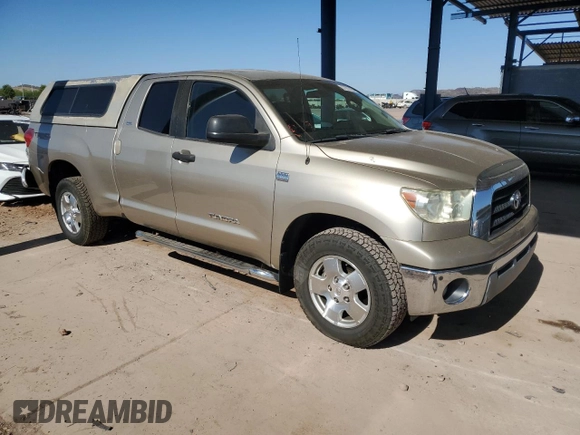 2007 Toyota Tundra SR5 with VIN 5TFRT54137X010649, listed as a Copart auction lot 57901625 with 131,378 mi miles and Salvage title. Bid and sale history available at DreamBid. Image 4.