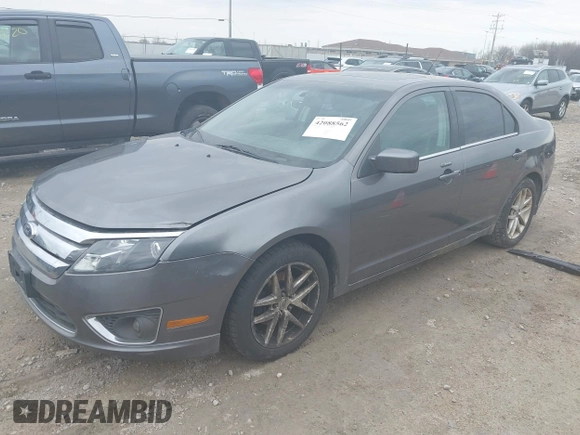 2011 Ford Fusion SEL with VIN 3FAHP0JG2BR232778, listed as a IAAI auction lot 42088562 with 186,584 mi miles. Bid and sale history available at carsss.com. Image 2.
