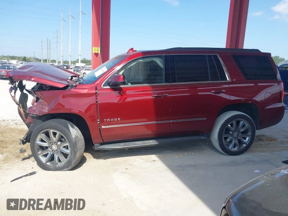 2018 Chevrolet Tahoe LT with VIN 1GNSCBKC5JR385935, listed as a IAAI auction lot 42116288 with 50,890 mi miles and . Bid and sale history available at DreamBid. Image 14.