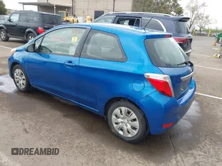 2013 Toyota Yaris L with VIN JTDJTUD3XDD572098, listed as a IAAI auction lot 41903113 with 106,900 mi miles. Bid and sale history available at carsss.com. Image 3.