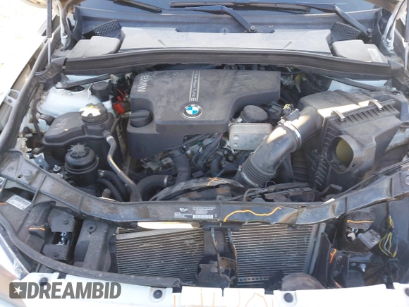 2015 BMW X1 xDrive28i z VIN WBAVL1C57FVY25598, wystawiony jako IAAI lot #41860463 z przebiegiem Nie podano mil oraz . Historia ofert i sprzedaży dostępna na DreamBid. Obrazek 10.
