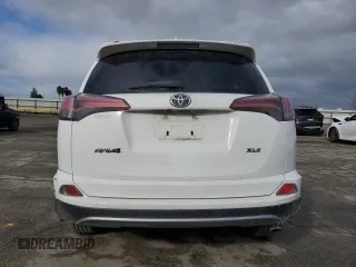 2018 Toyota RAV4 XLE with VIN 2T3WFREV1JW471752, listed as a Copart auction lot 46952565 with 87,705 mi miles and Salvage Title. Bid and sale history available at DreamBid. Image 6.