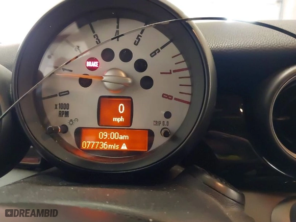2014 MINI Cooper Convertible S with VIN WMWZP3C59ET298305, listed as a IAAI auction lot 41679657 with 77,736 mi miles. Bid and sale history available at carsss.com. Image 7.