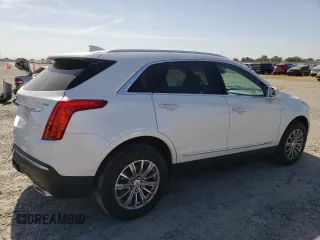 2017 Cadillac XT5 Luxury AWD with VIN 1GYKNDRS0HZ180703, listed as a Copart auction lot 58793895 with 30,339 mi miles and Salvage title. Bid and sale history available at DreamBid. Image 3.