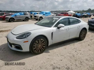 2017 Porsche Panamera с VIN WP0AA2A71HL102183, выставлен на аукционе Copart как лот 57901885 с пробегом 51 605 миль миль и Списание • Salvage title. История ставок и продаж доступна на DreamBid. Изображение 1.