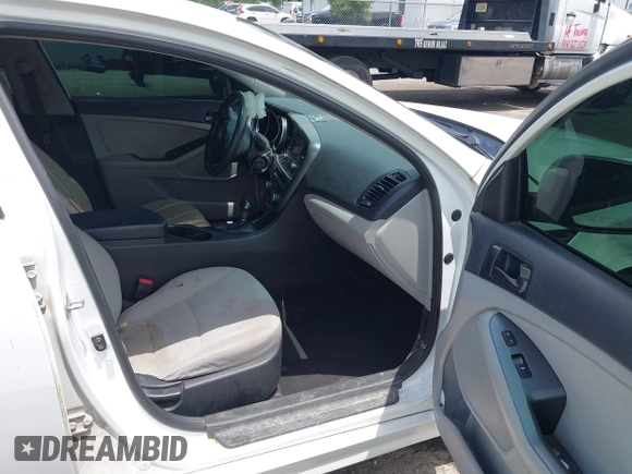 2015 Kia Optima LX with VIN KNAGM4A76F5639319, listed as a IAAI auction lot 42552130 with 207,006 mi miles and . Bid and sale history available at DreamBid. Image 5.