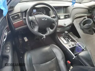 2013 Infiniti M with VIN JN1BY1AR2DM601965, listed as a Copart auction lot 62014215 with 134,047 mi miles and Salvage title. Bid and sale history available at DreamBid. Image 8.