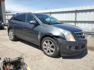 2012 Cadillac SRX Performance Collection z VIN 3GYFNEE31CS602568, wystawiony jako Copart lot #54751375 z przebiegiem 144 228 mil mil oraz Szkody całkowita. Historia ofert i sprzedaży dostępna na DreamBid. Obrazek 4.