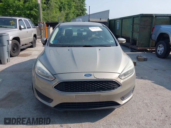 2016 Ford Focus SE z VIN 1FADP3F29GL361006, wystawiony jako IAAI lot #42387418 z przebiegiem 132 806 mil mil oraz . Historia ofert i sprzedaży dostępna na DreamBid. Obrazek 6.
