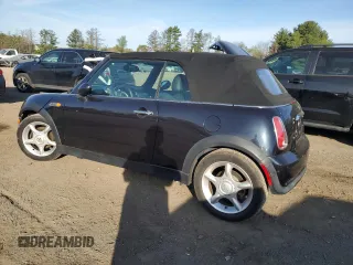 2006 MINI Convertible with VIN WMWRF33576TG15523, listed as a Copart auction lot 54199155 with 60,512 mi miles and Clean Title. Bid and sale history available at DreamBid. Image 2.