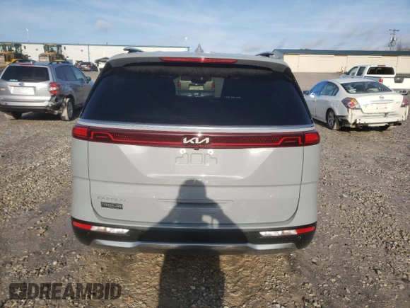2023 Kia Carnival SX with VIN KNDNE5H31P6265228, listed as a Copart auction lot 84086194 with 34,135 mi miles and Salvage Title. Bid and sale history available at carsss.com. Image 6.
